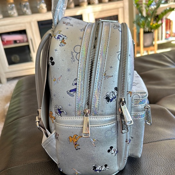 Collectible Disney 100 Loungefly Silver Character Backpack - Picture 4 of 5